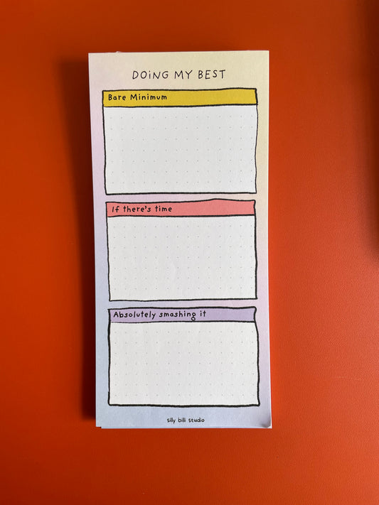 Notebook with three blank pages labeled 'Doing my best'