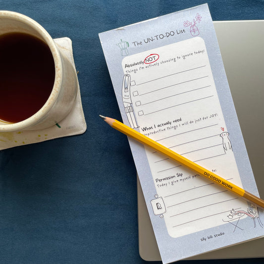 Notebook with a to-do list with a cup of coffee 