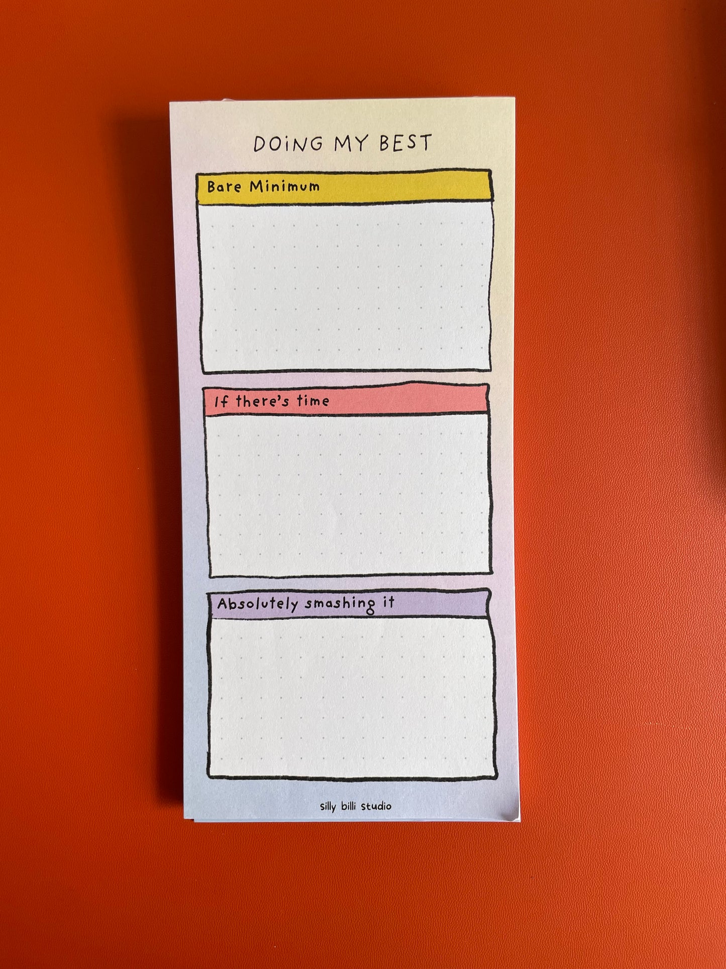 Notebook with three blank pages labeled 'Doing my best'